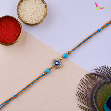 Blue Evil Eye Rakhi with Crystal Flower Charm