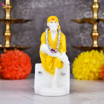 Shirdi Sai Baba Idol – 4 inches - Yellow Robe Polyresin Statue with Decorative Stone Garland
